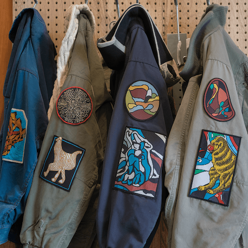 Various custom patches on multiple jackets