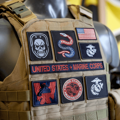 tactical vest with multiple custom tactical patches