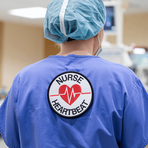 A healthcare worker wearing a custom healthcare patch on their uniform